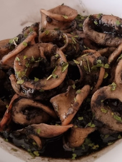 Una foto de Calamares en su tinta