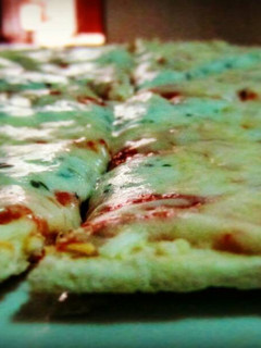 Una foto de Pizza 4 quesos