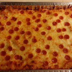 A picture of Baked pizza spaghetti .