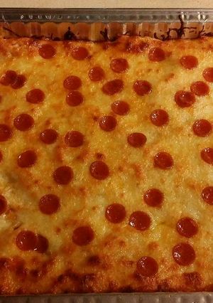 A picture of Baked pizza spaghetti .