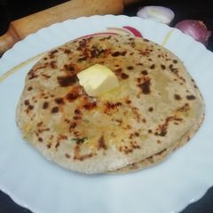 A picture of Cilantro and Paneer Paratha.