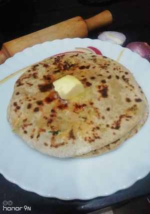 A picture of Cilantro and Paneer Paratha.