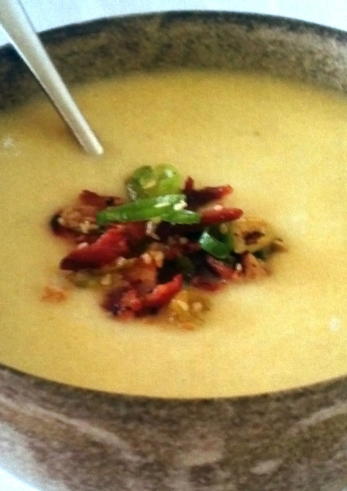 A picture of Creamy Cauliflower Soup with Bacon bites.