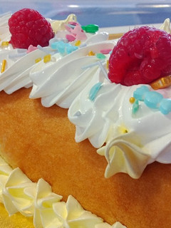 Una foto de Brazo de lemon curd y merengue