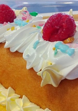 Una foto de Brazo de lemon curd y merengue