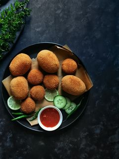 আস্ত  ডিমের আলুর চপ রেসিপির প্রধান ছবি