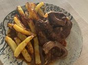 Una foto de ossobuco romero
