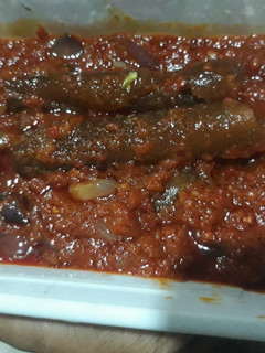 A picture of Tomato stew with pomo.