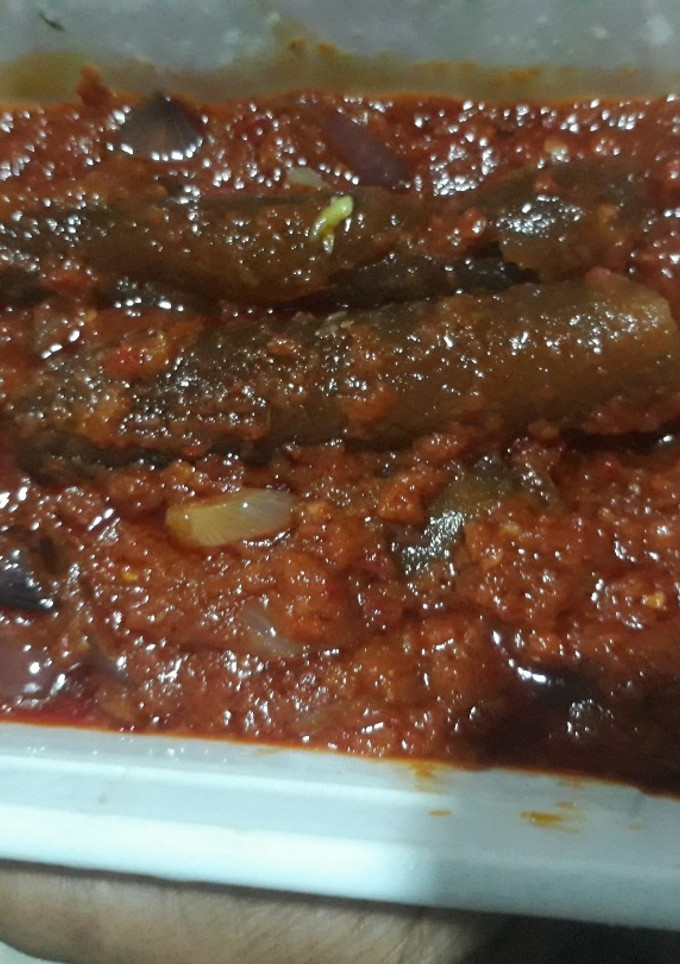 A picture of Tomato stew with pomo.