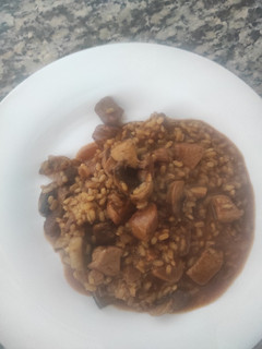 Una foto de Arroz con solomillo y champiñones