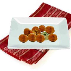 A picture of Vegetable Bonda  (deep fried veggetable balls).