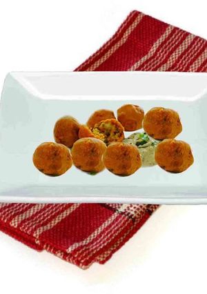 A picture of Vegetable Bonda  (deep fried veggetable balls).