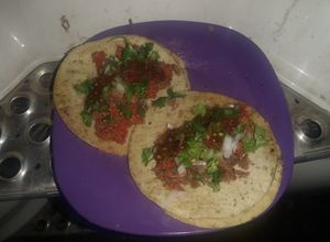 Una foto de Tacos de suadero y longaniza