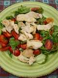 Petto di pollo con pomodorini e rucola