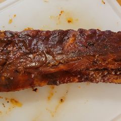 A picture of Oven backed Rib rack w/ homemade sauce and rub.