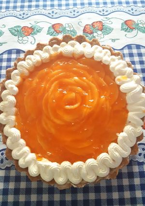 Una foto de Tarta de duraznos con crema