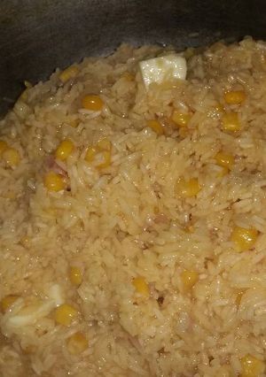 Una foto de Arroz de maíz con queso