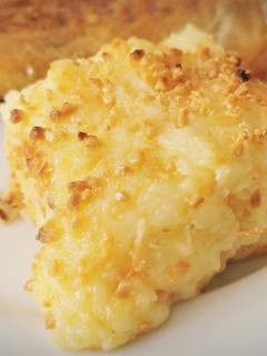 Una foto de Puré de Patatas gratinado con Queso y Almendra