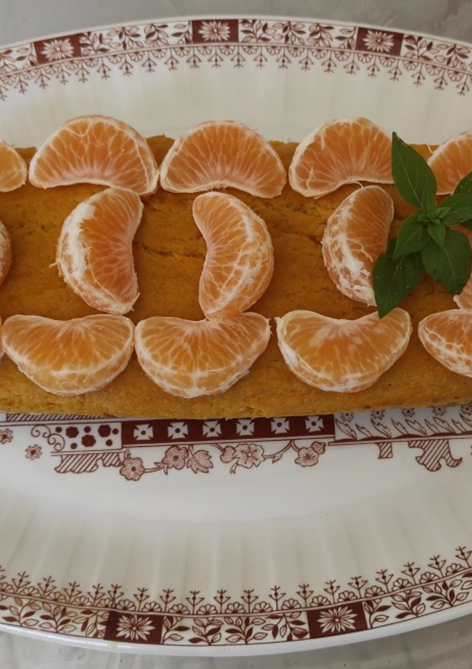 Una foto de Tarta de calabaza con gajos de naranja