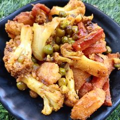 A picture of Aloo Gobhi matar gajar ki sookhi sabji.