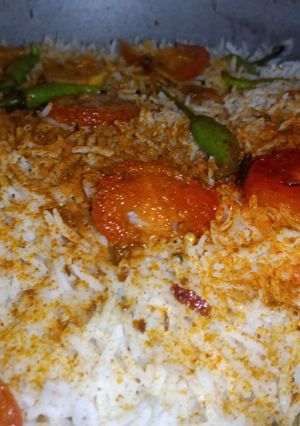 A picture of Smokey Chicken Biryani.
