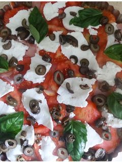 Una foto de Pizza en base de coliflor (gluten free)