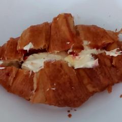 A picture of My Croissant filled Rassberry Jam & Clotted Cream.