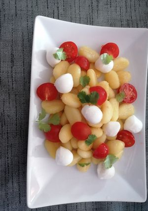 Une photo de Gnocchis tomate mozzarella coriande