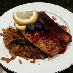 A picture of Brad's blackened salmon with blueberry balsamic reduction.