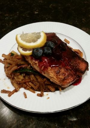 A picture of Brad's blackened salmon with blueberry balsamic reduction.