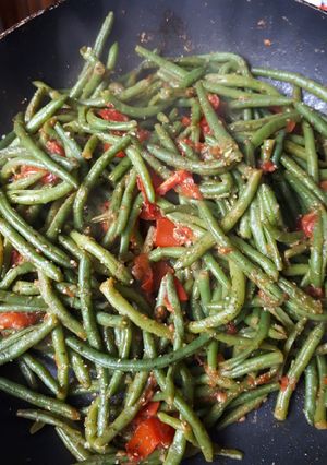 Une photo de Haricots verts et tomates
