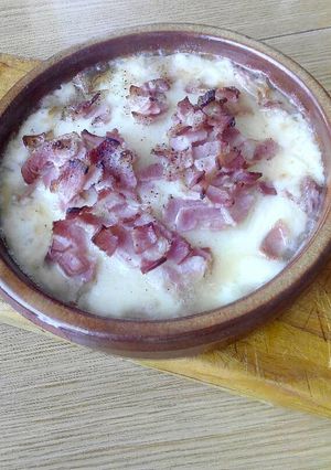 Una foto de Provolone al horno con bacon