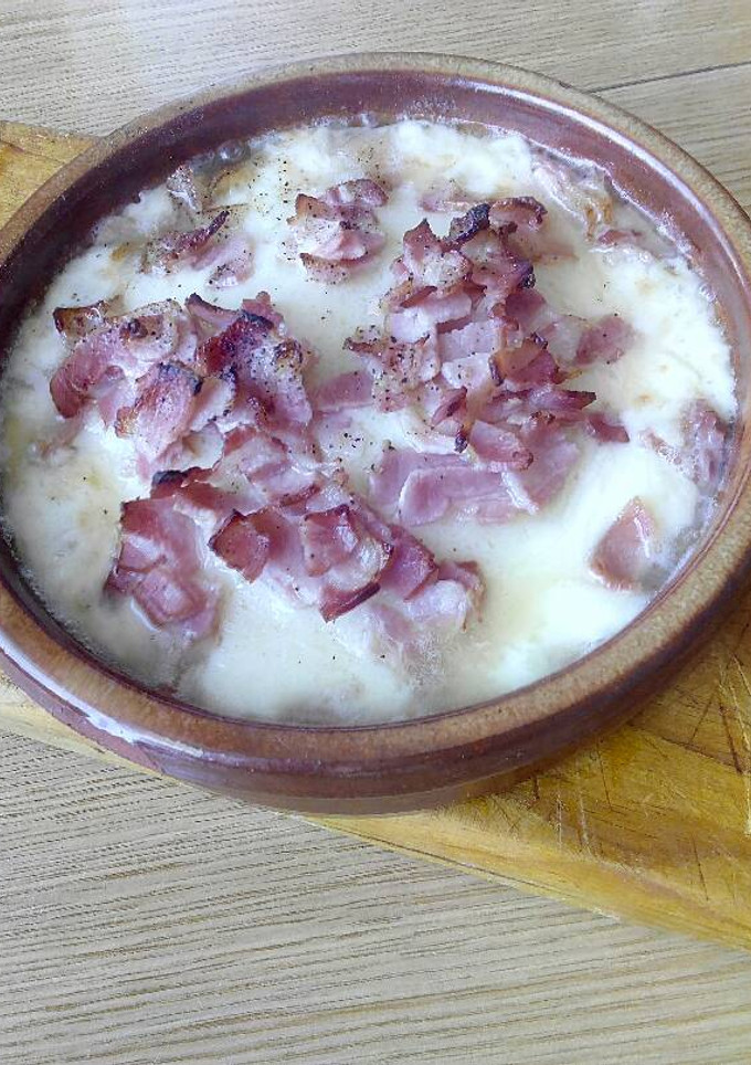 Una foto de Provolone al horno con bacon