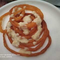 A picture of Jalebi with Rabri.