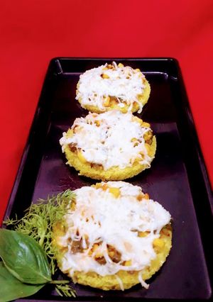 A picture of Dhokla pizza.