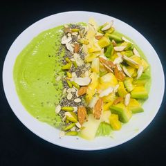Avocado, mango, spinach smoothie bowl A picture of Avocado, mango, spinach smoothie bowl.