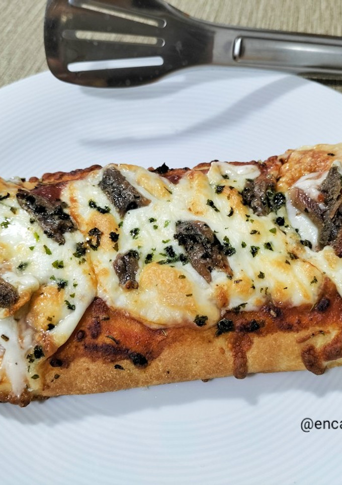 Una foto de Focaccia con scamorza y anchoas en airfryer