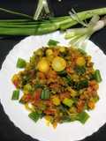 हरे प्याज़ की चटपटी सब्जी