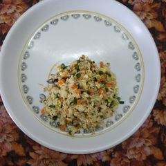 A picture of Brown rice egg fried rice.