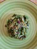 Gnocchetti con pesto di rucola, speck e scorzette di limone