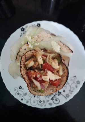 A picture of Papad butter masala.