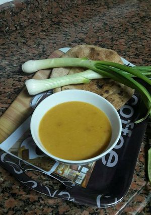 A picture of Lentil Soup with Toasted Bread.