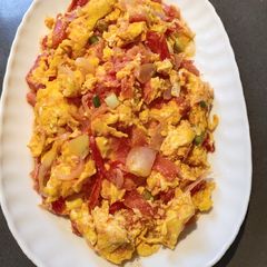 A picture of Egg with Tomato.