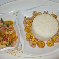 A picture of Rice and shredded chicken.