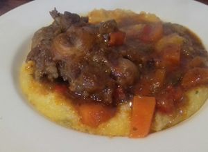 Una foto de Polenta con rabo