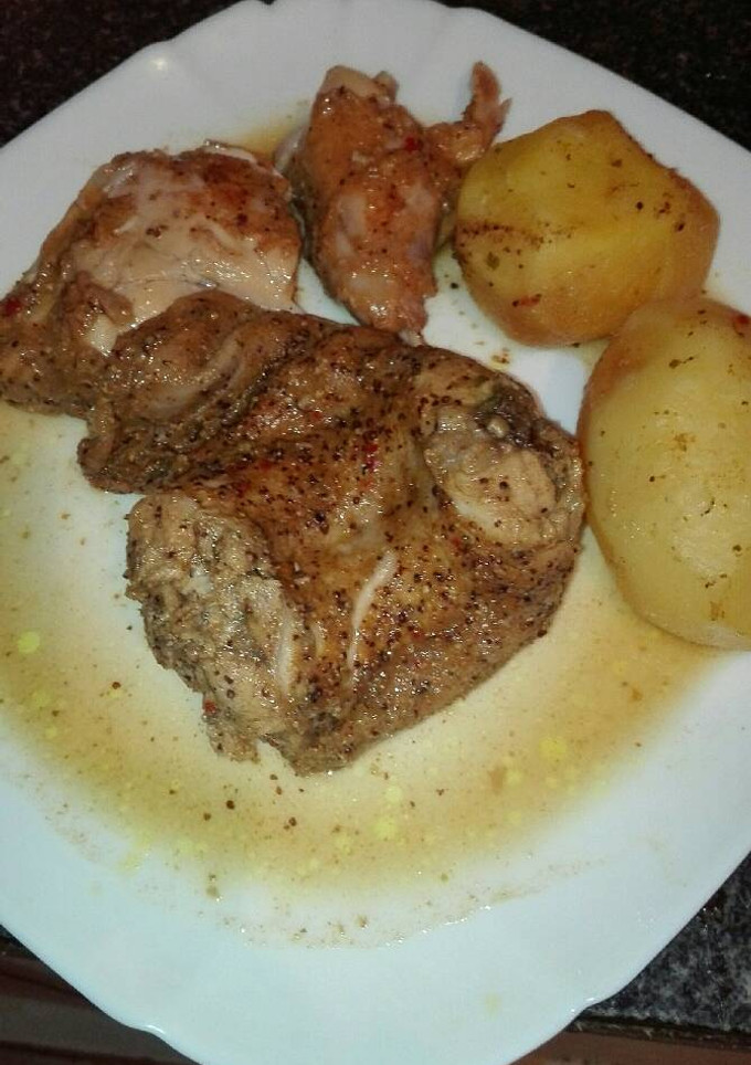 Una foto de Conejo al horno adobado a mi manera