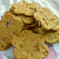 A picture of Baked masala checkers.