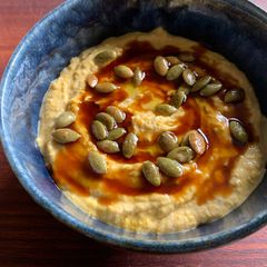 A picture of Pumpkin Hummus with Pomegranate Molasses.