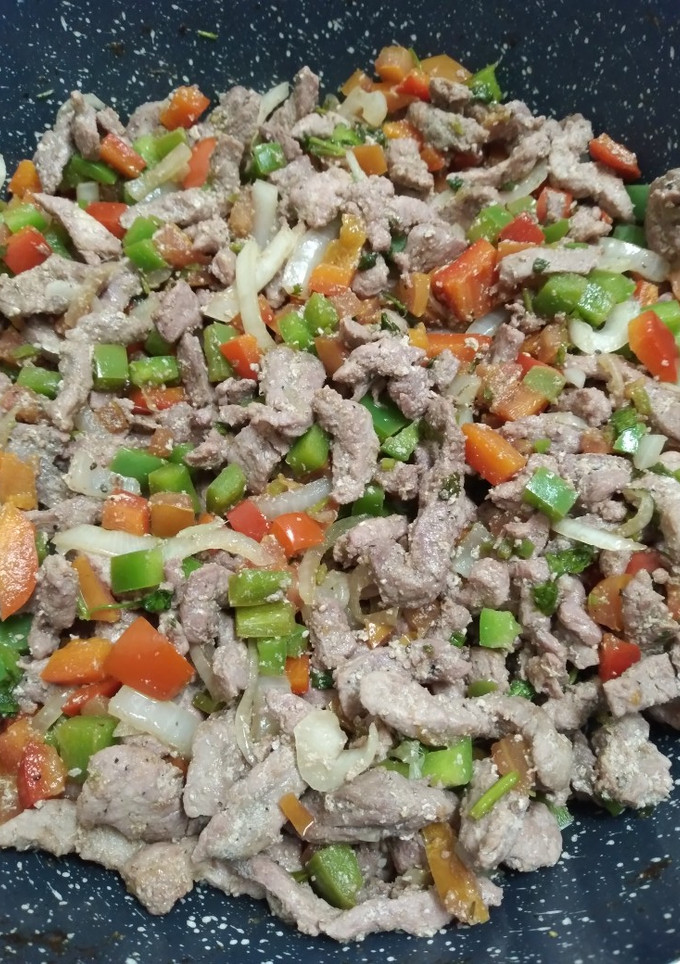 Una foto de Milanesa de cerdo a la mexicana