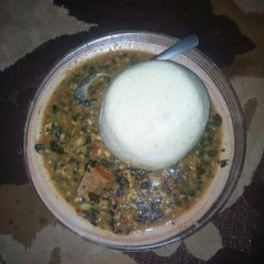 A picture of Tuwon shikafa with miyar zogale(Moringa soup).